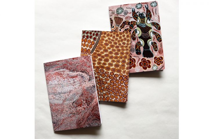 Notebook trio with cover art by Louise Malarvey, Mignonette Jamin, Betty Bundamurra.