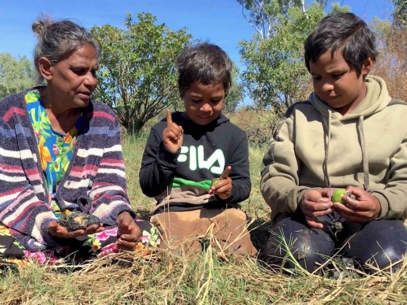 Dora with grandkids_bush camp.jpg