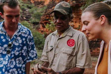 Waringarri Aboriginal Art and Culture tours - Mirima tour Chris with visitors.jpg